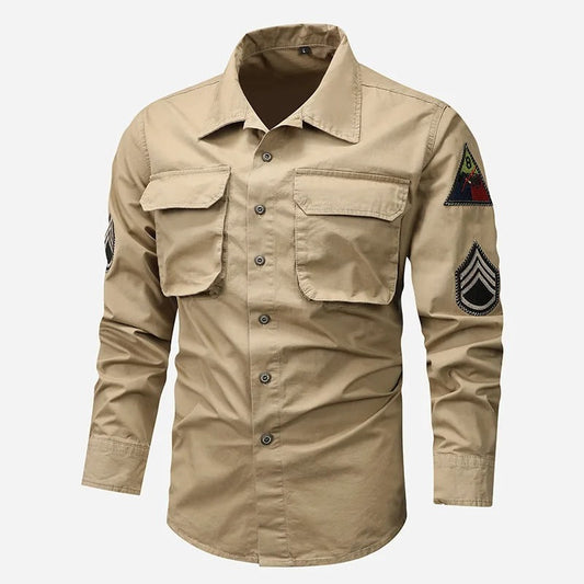 Tactical arm badge shirt in tan color with dual front pockets and embroidered patches for outdoor activities