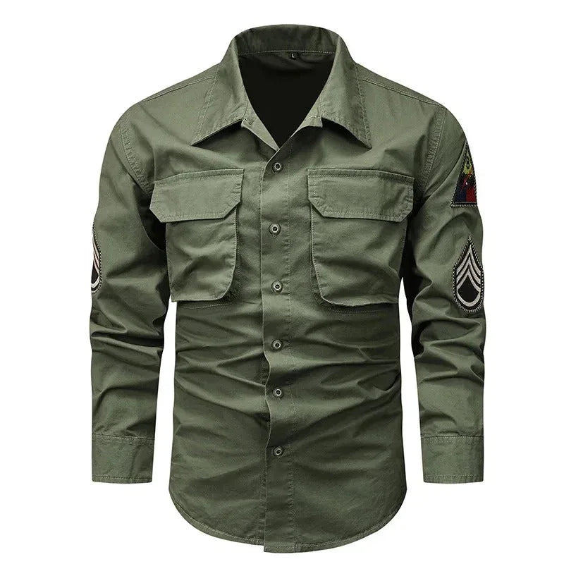 Tactical arm badge shirt in olive green with two front pockets and embroidered patches