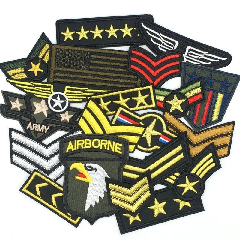 Variety of tactical military patches featuring Airborne and Army designs in vibrant colors