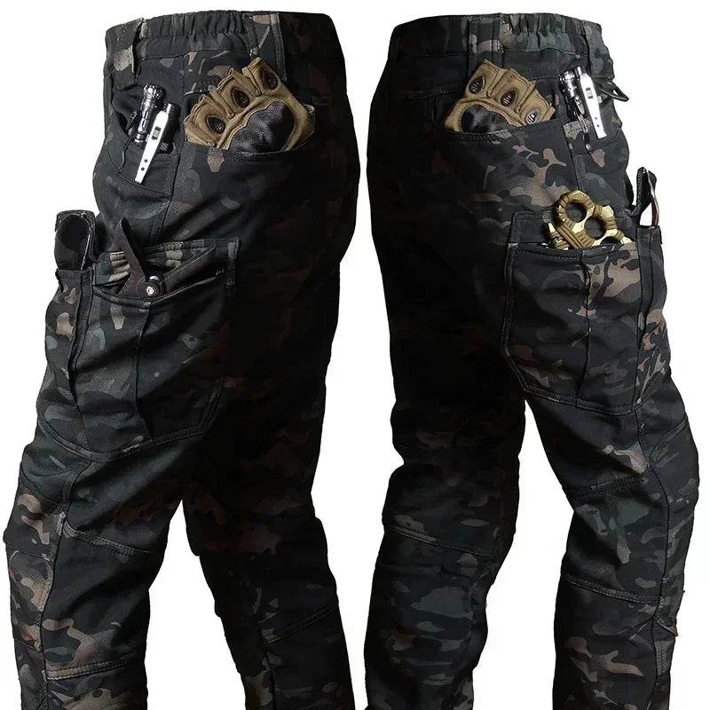 Men's tactical winter pants in camo with multiple pockets for storing gear and tools