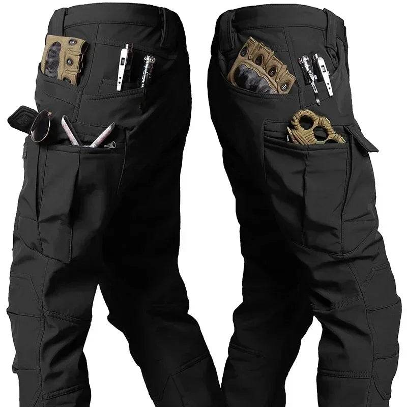 Black tactical winter pants featuring multiple pockets for gear and accessories
