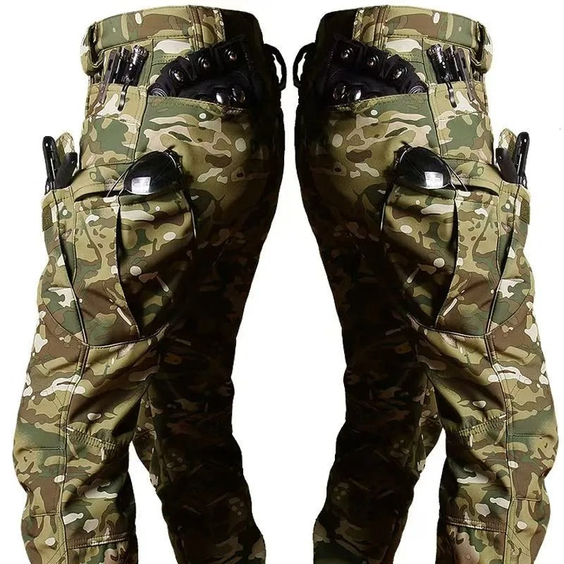 Rear view of tactical winter pants featuring multiple pockets for military outdoor use