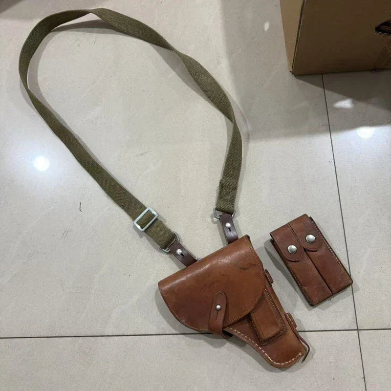 Tokarev leather holster with adjustable strap for secure firearm carrying