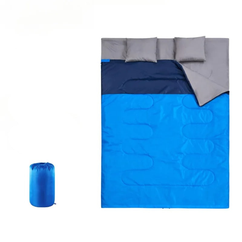 Two person sleeping bag in blue for camping trips with included storage bag