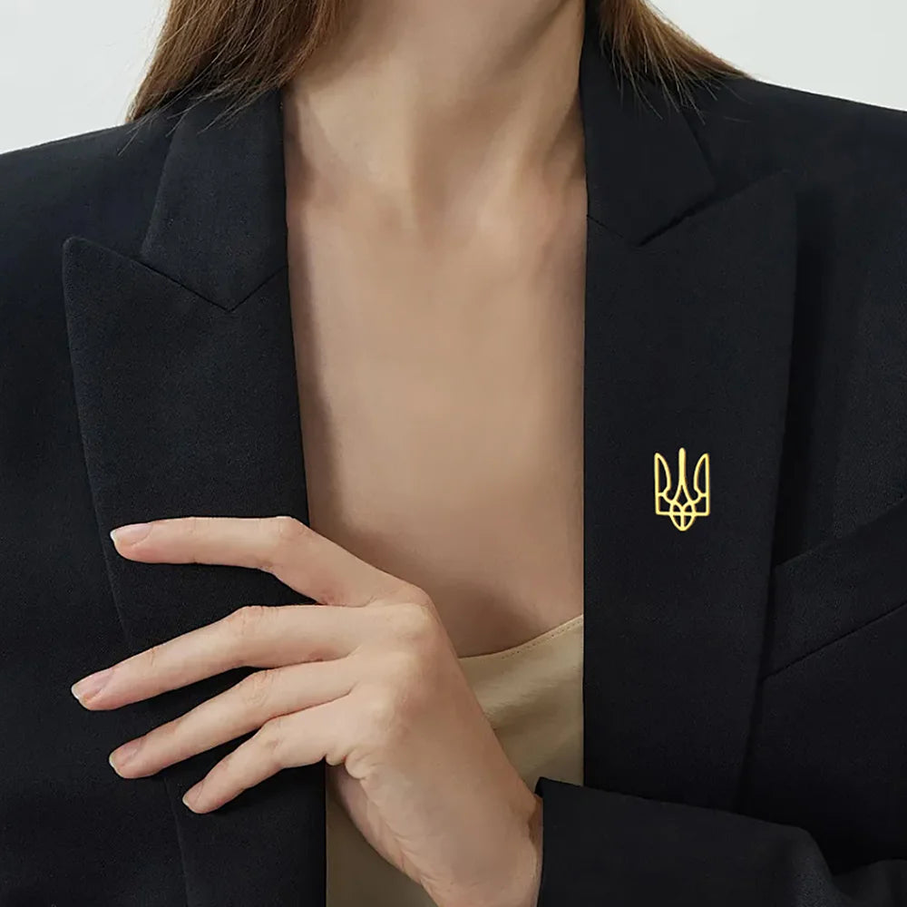 Ukraine symbol pin in gold, ideal for patriotic display or gifting