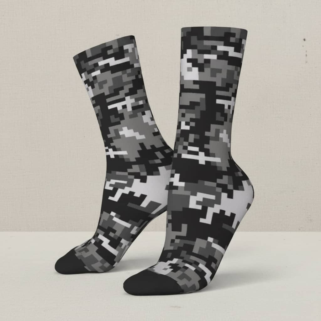 US Army crew socks in grey camouflage for tactical outdoor wear on a neutral background