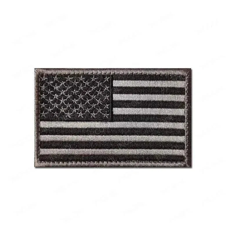 US Flag Embroidered Patch in black and gray with detailed stitching for military gear or apparel
