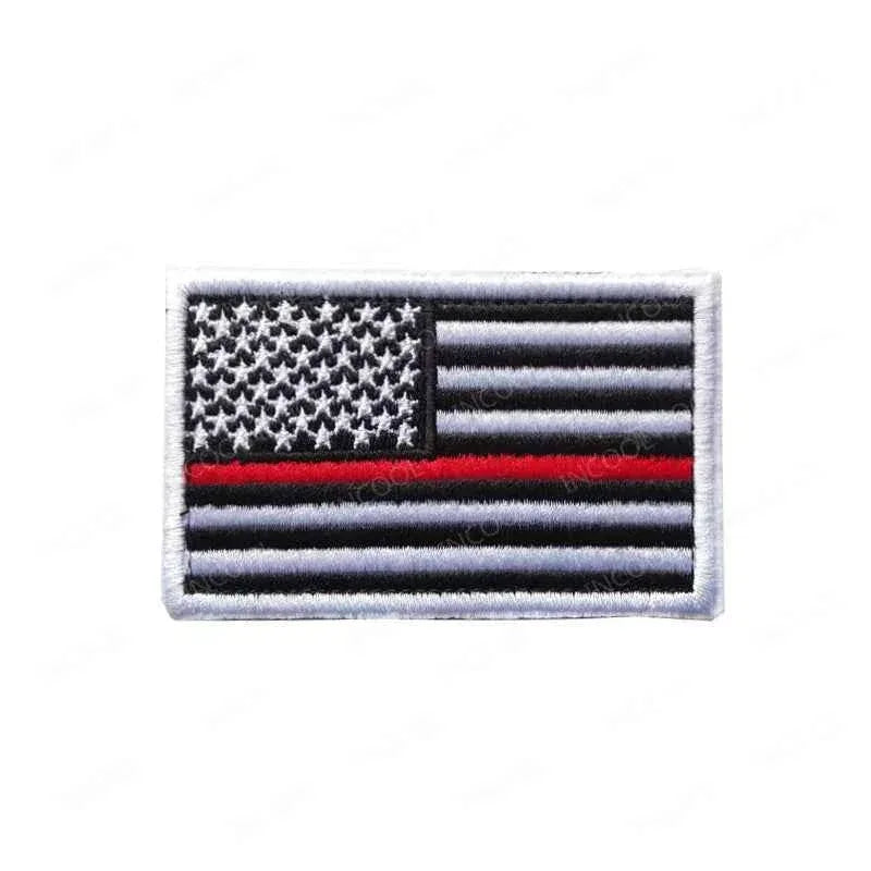 US Flag Embroidered Patch with a black and white design featuring a red stripe