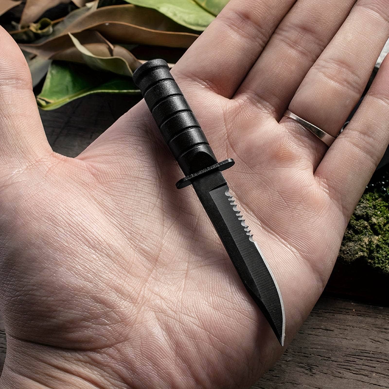 Black mini outdoor knife perfect for camping and survival tasks