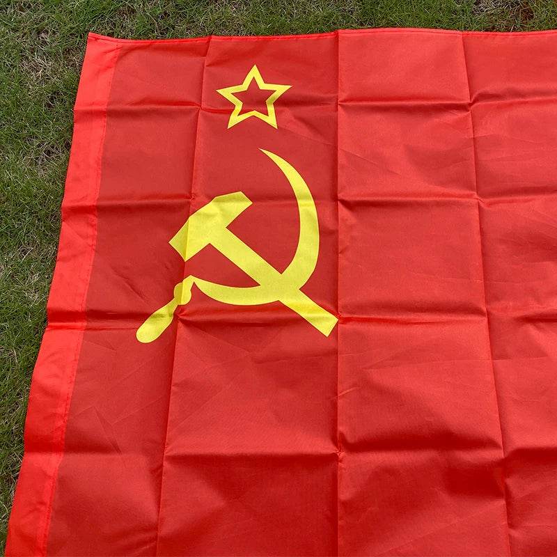 USSR flag in red featuring yellow hammer and sickle design