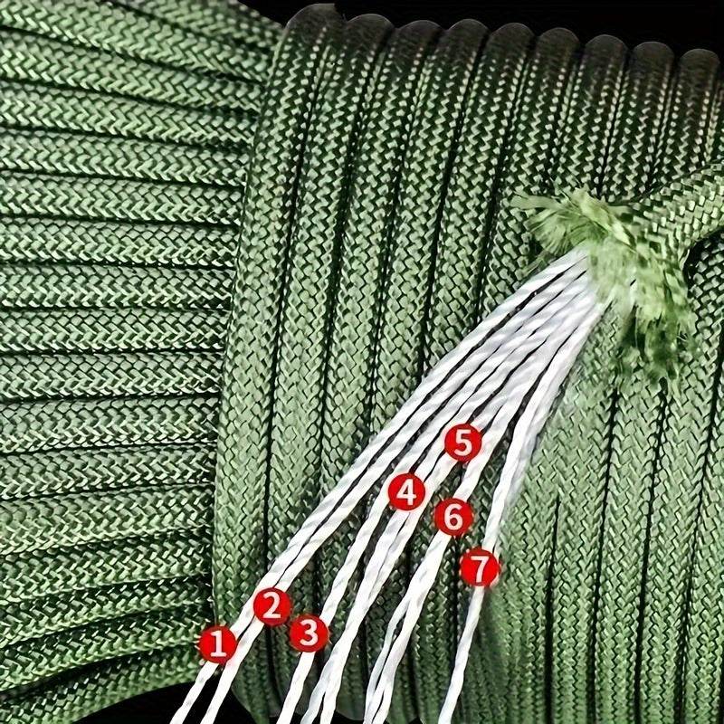 Green outdoor tent cord with multiple strands for secure camping setups and outdoor activities