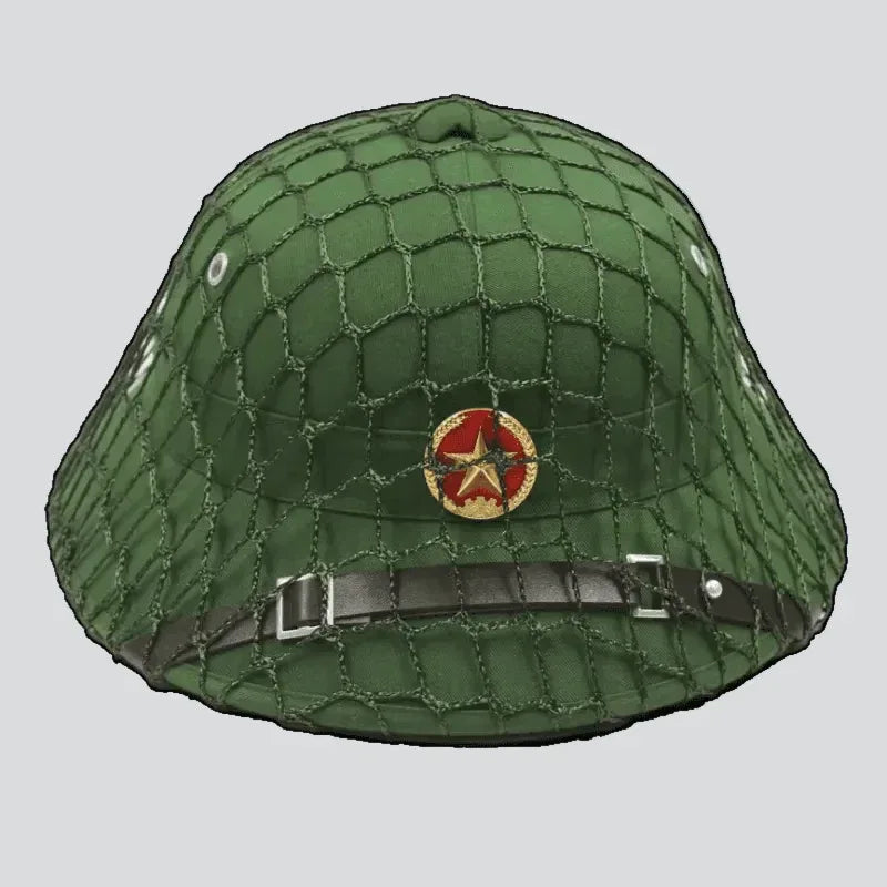 Vietnam Army tactical helmet in green with camouflage netting and emblem
