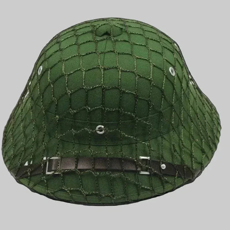 Vietnam Army tactical helmet in green with netting for enhanced camouflage