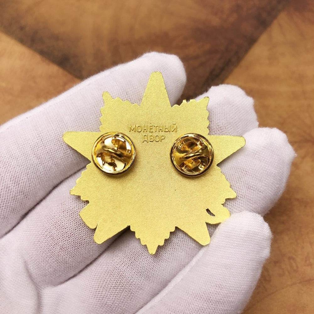 Vintage USSR war medal with red ribbon and golden star design, ideal for history enthusiasts