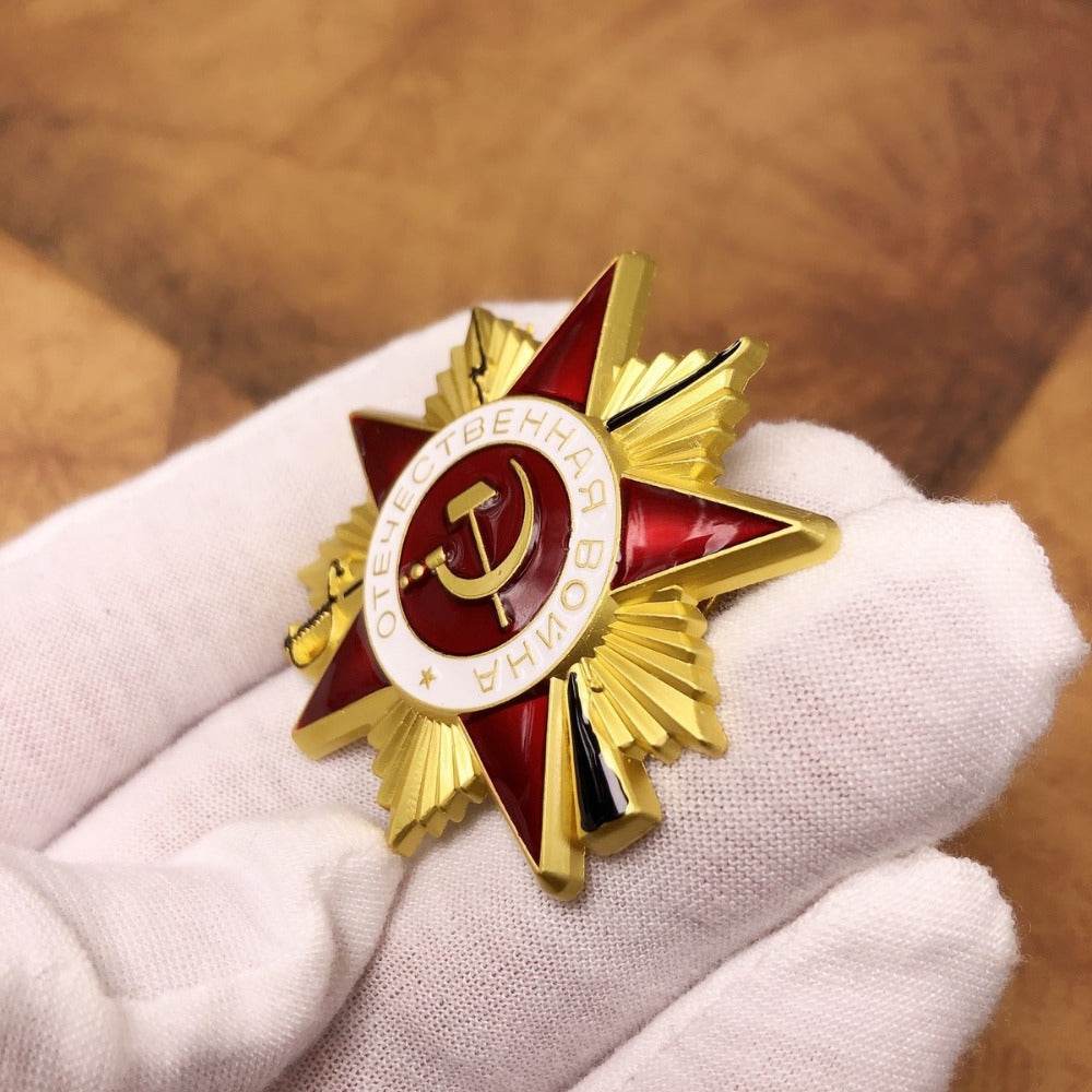 Vintage USSR war medal with red ribbon and golden star design