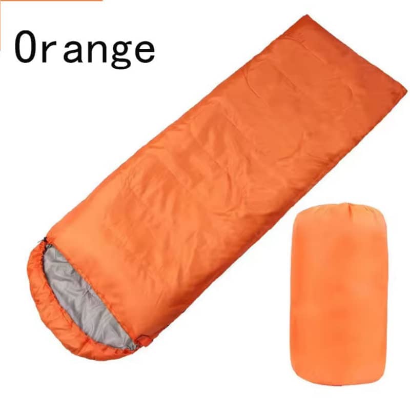 Orange warm sleeping bag for camping and outdoor adventures