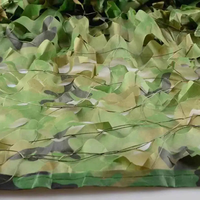 Close-up of woodland camouflage netting designed for outdoor concealment and tactical use