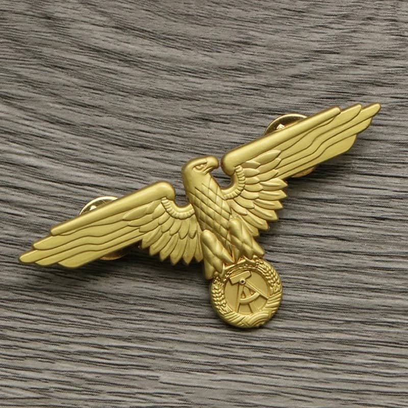 Gold WW2 eagle badge for military enthusiasts and collectors
