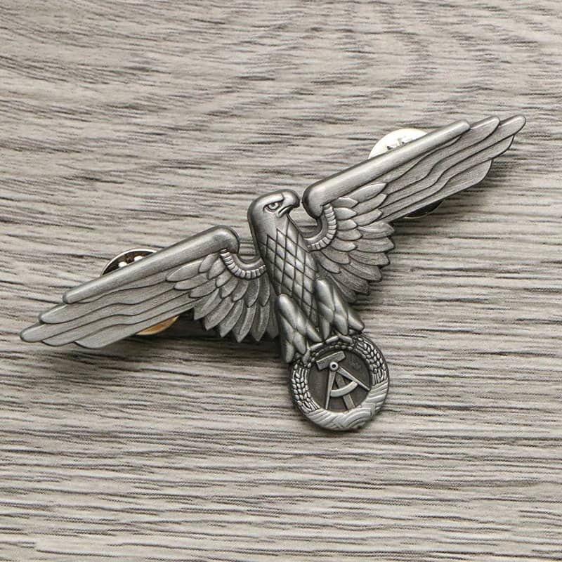 Silver WW2 eagle badge with detailed wings and emblem