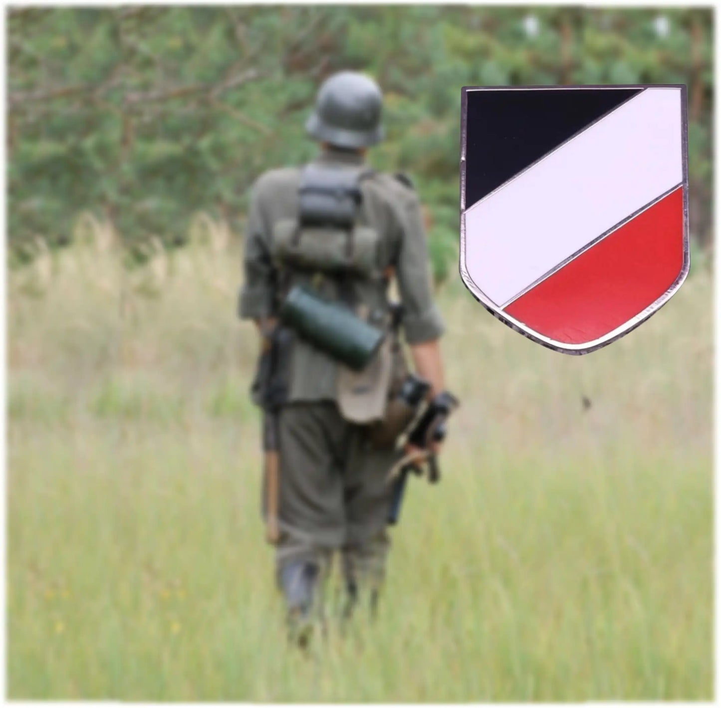 WWII German helmet badge displayed alongside a soldier in period military gear walking in a grassy field