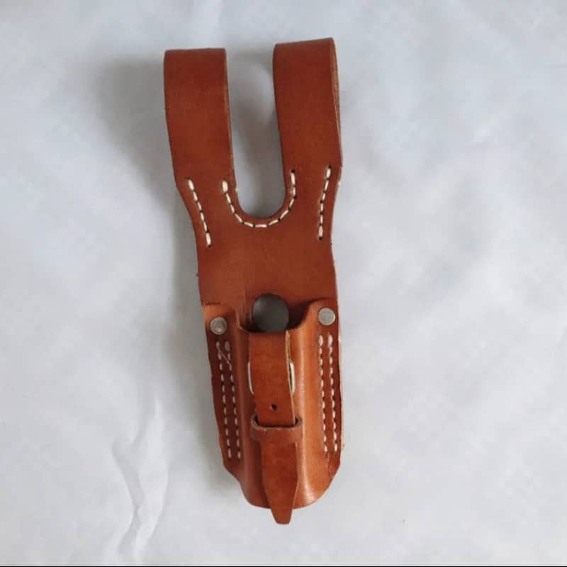 Brown leather WWII Japanese bayonet frog with adjustable strap for secure carrying