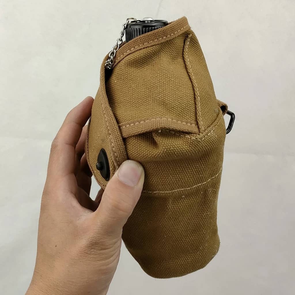 WWII marine canteen kettle in tan fabric for outdoor adventures