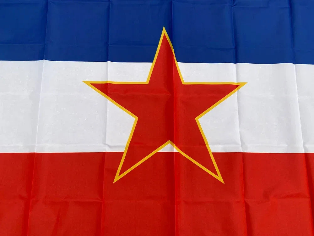 Yugoslavian historical flag featuring a blue top stripe, white middle, and red bottom with a red star